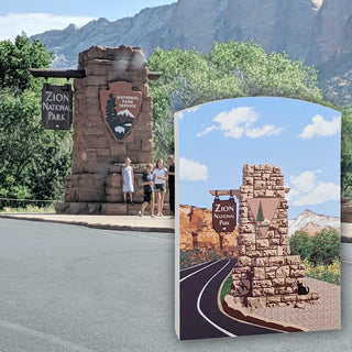 A printed art print or postcard showing an illustrated Zion National Park entrance scene, displayed in front of a real outdoor photo of the actual Zion National Park monument with people and mountains in the background.